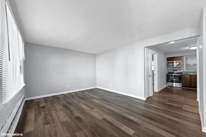 Building Photo - 7617 S Colfax Ave