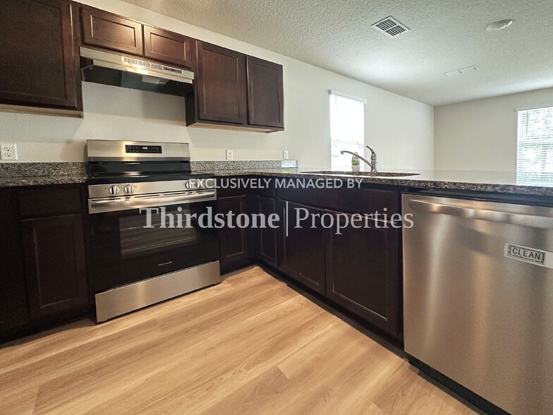 Building Photo - 6522 Sweetbay Ln