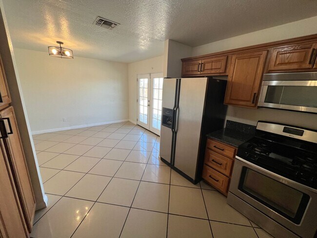 Building Photo - Move-In Ready Beauty with Granite Kitchen, Stainless Steel Appliances & Expansive Backyard