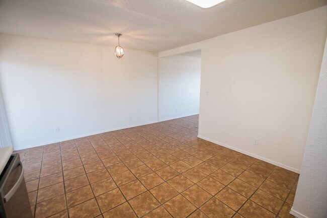 Building Photo - Charming Property Features 3 Bedrooms, 2 Baths, Central A/C!!