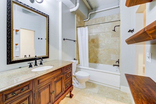 Building Photo - Exceptional 1 bed/1bath loft-style unit in...