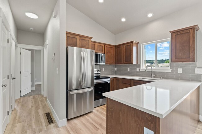 Building Photo - Newly Built 4 Bedroom Duplex With Yard