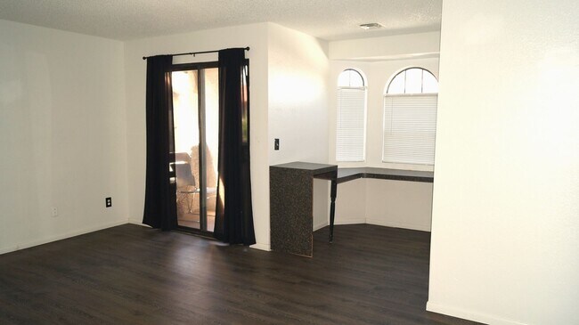 Building Photo - End Unit with Strip Views