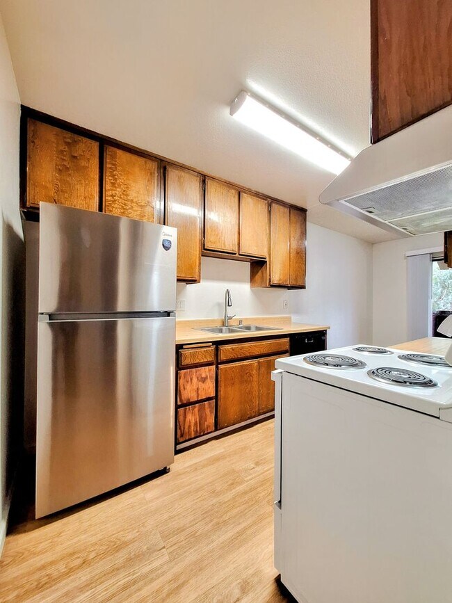 Building Photo - Beautiful 2bd Condo In Gated Community With Pool, Gym, and On-site Laundry