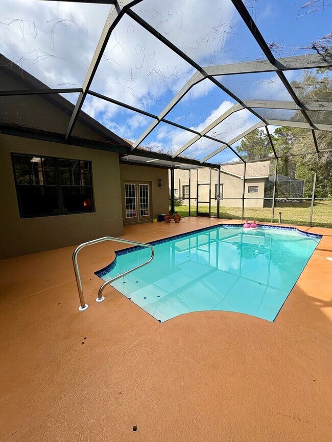 Building Photo - Beautiful 4bed/2bath Pool Home on Conservation Lot