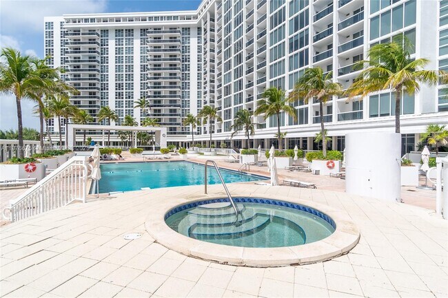 Building Photo - 10275 Collins Ave