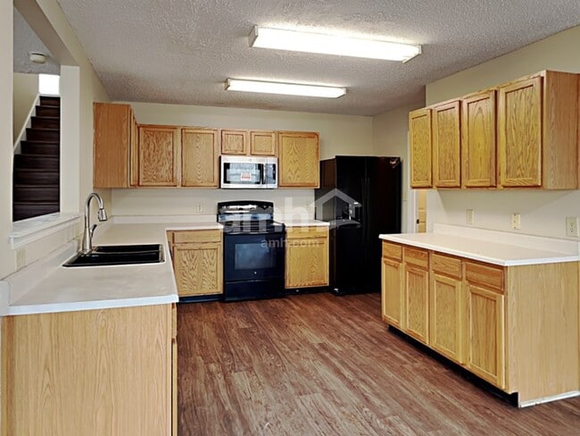 Building Photo - 6850 W Littleton Dr