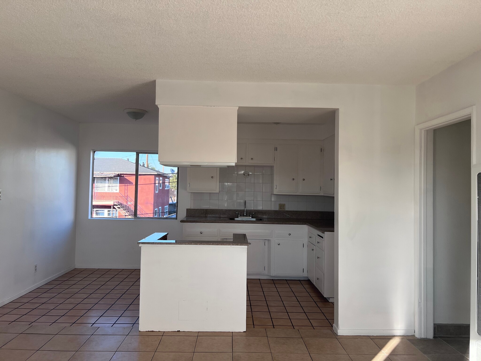 Kitchen view from living room - 8129 Otis St
