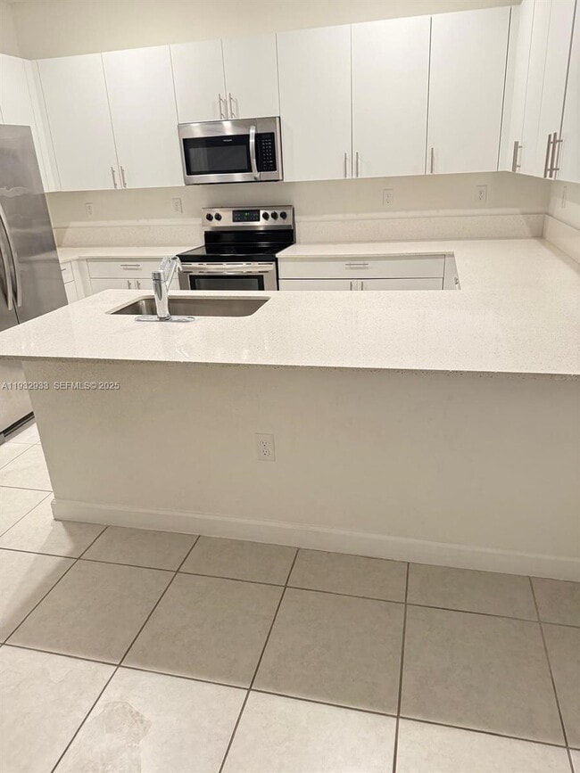 Building Photo - Southwest 232nd Street, Goulds, FL 33170 - 3 BR 2.5 BA townhouse