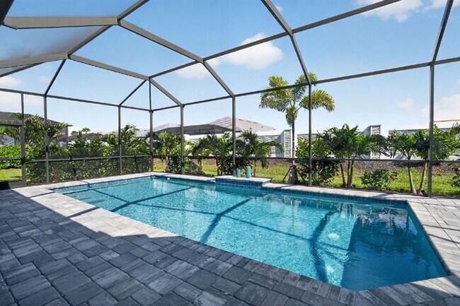 Building Photo - Price improved — luxury pool home in Esplanade at Azario · $7,400/mo