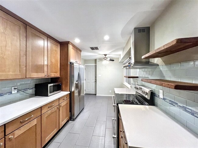 Building Photo - 8305 Greenslope Dr