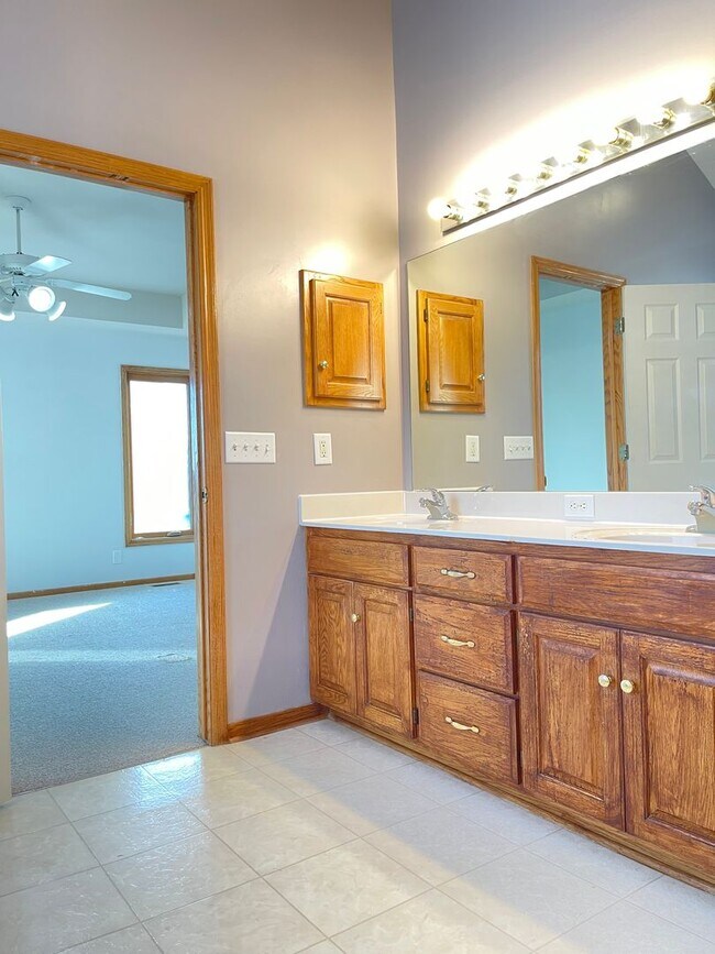 Building Photo - Northwest Omaha Gem: 2,700 Sq Ft, 3-Bedroom, Walk-Out Finished Basement, Fenced Yard, 3-Car Garag...