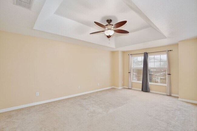 Building Photo - Luxury 3BR/3BA Townhome with 2-Car Garage in Gated Greystone – Sanford