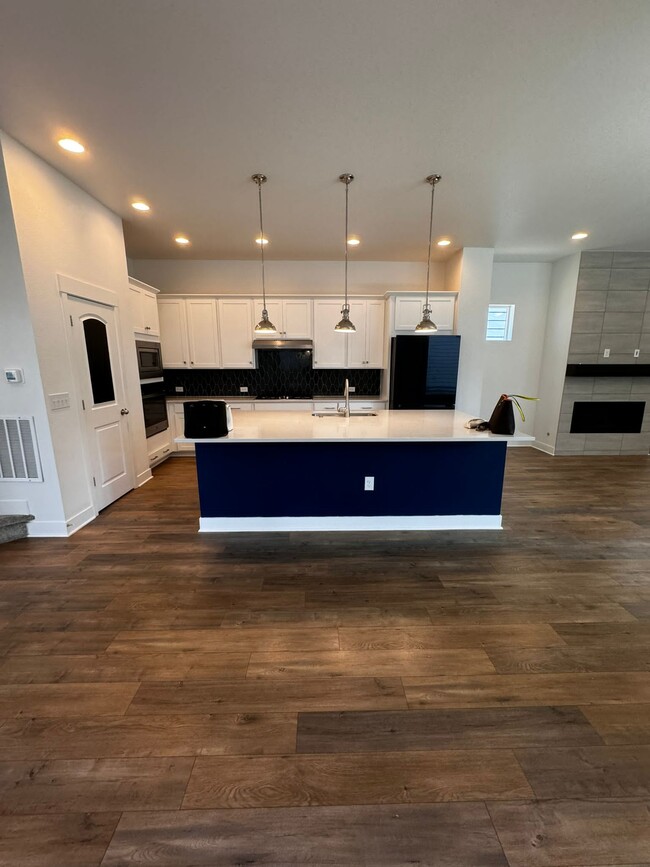 kitchen main floor - 21622 E 60th Ave