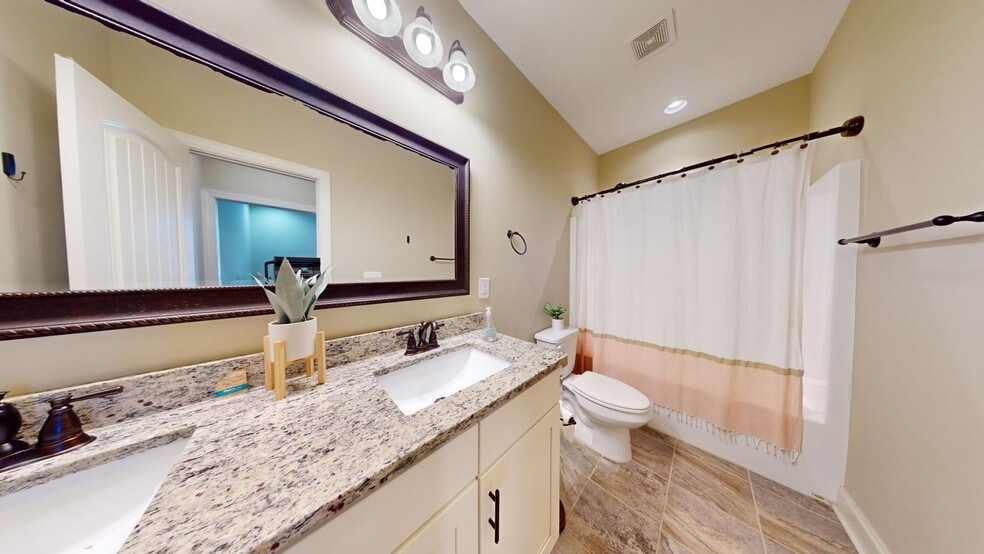 Building Photo - 3855 Academy Dr