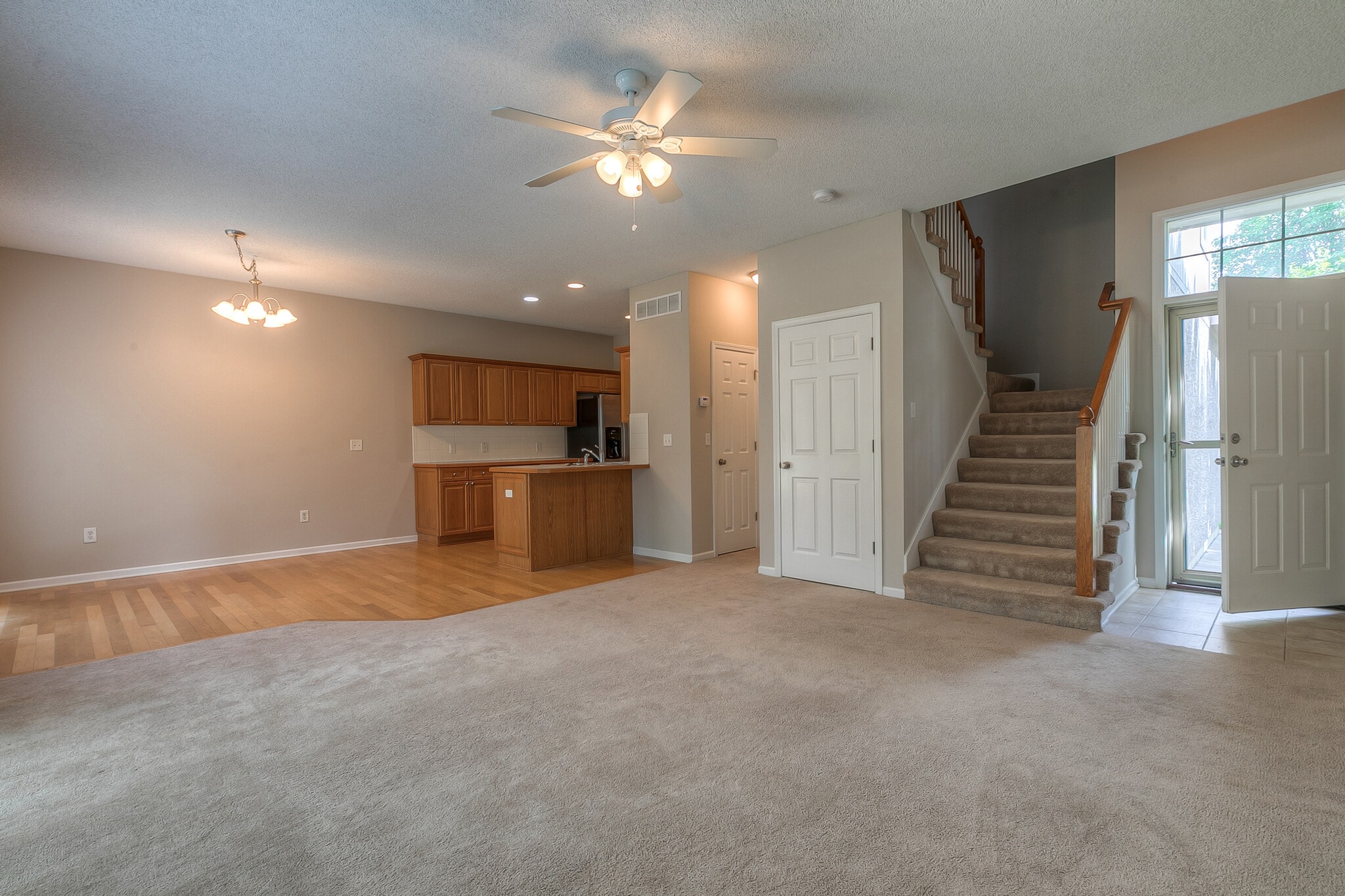 entry opens to living room and stairs to 2nd level. - 22810 West 71st Terrace