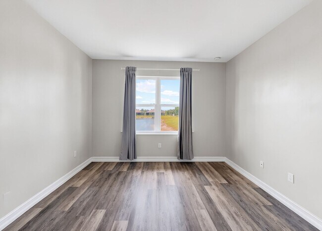 Building Photo - Live the Southwest Florida lifestyle in this lakefront villa in South Naples!