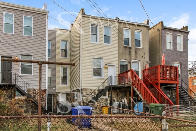 Building Photo - Welcome to this charming abode.