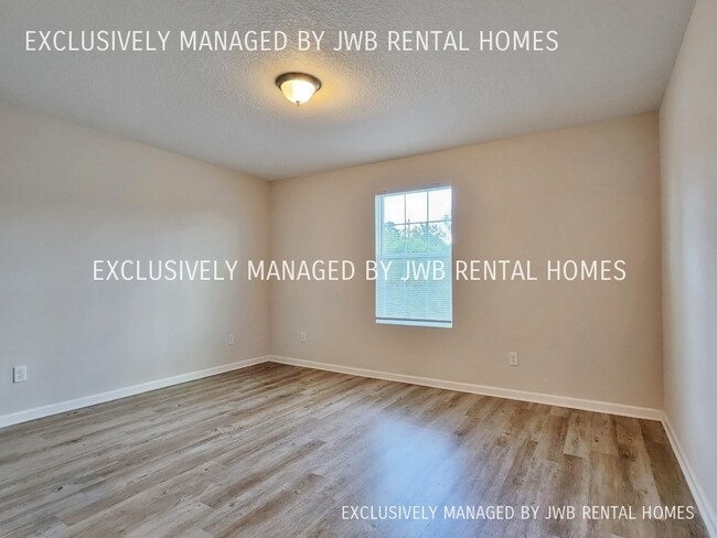 Building Photo - 8476 McGirts Village Ln
