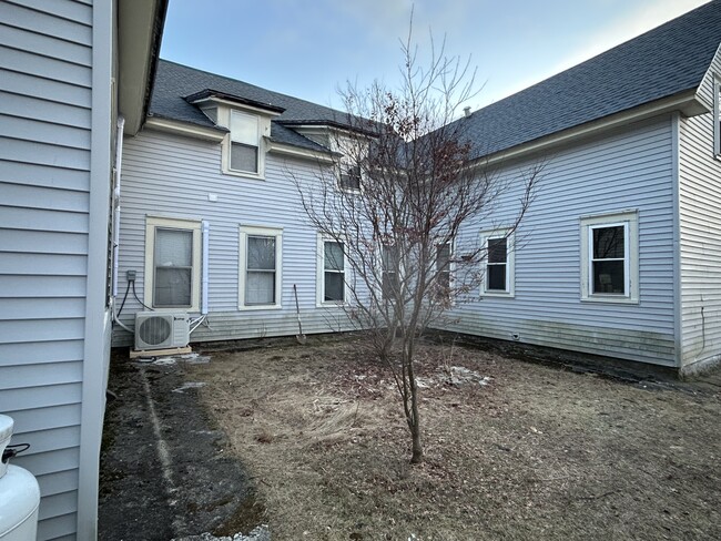 Inner courtyard. - 23 Pleasant St