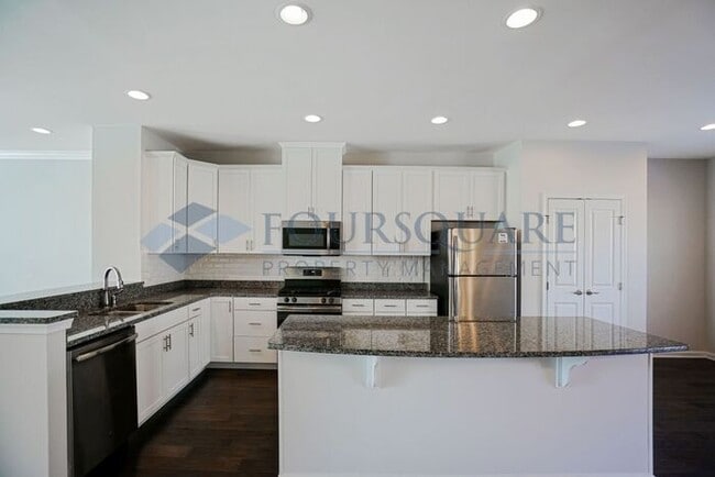 Building Photo - Spacious 3-Story Townhome with Bonus Suite & 2-Car Garage – In the Heart of RTP