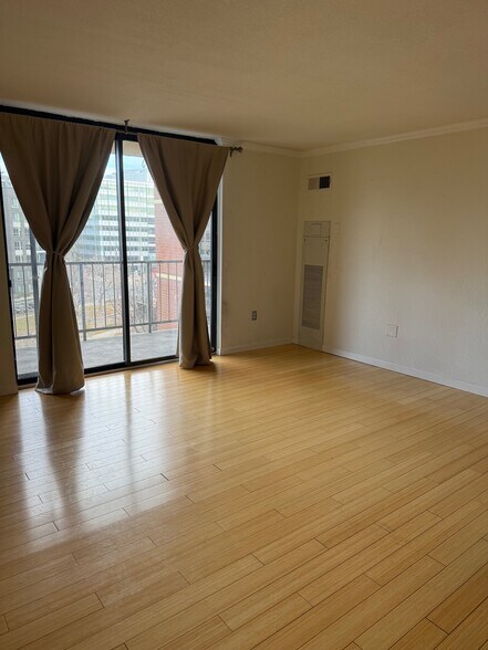 Living Room and Balcony Access - 1301 Speer Blvd
