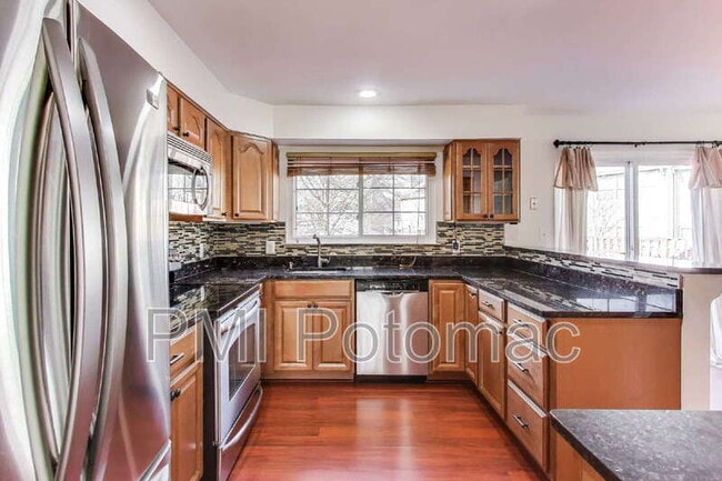 Building Photo - 8417 Meadow Green Way