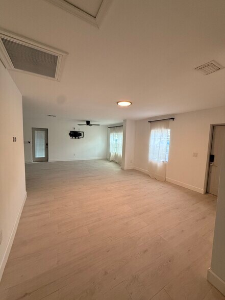 Tiled floors for easy clean up and a wall mounting spot for your TV - 4724 W Tambay Ave