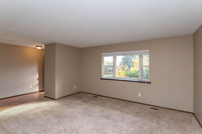 Building Photo - Comfortable Ranch-Style Living with Large Fenced Backyard!