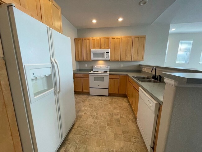 Building Photo - Built to Spoil! Gated Community in Denver with attached Garage!