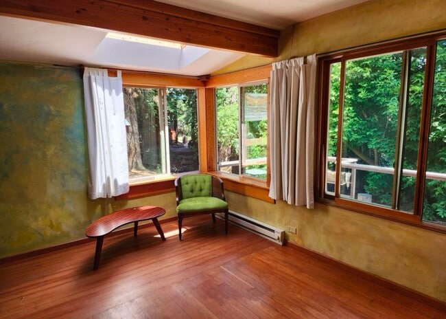 Building Photo - Renovated In-Town Home with Creek & Garage