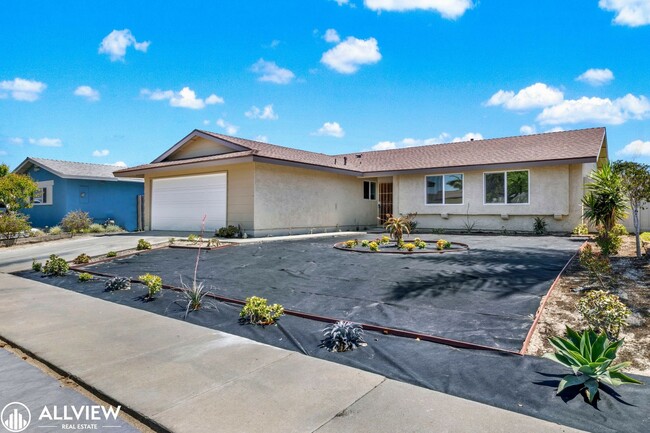 Building Photo - Fully Renovated 4-Bedroom Home with Firepl...
