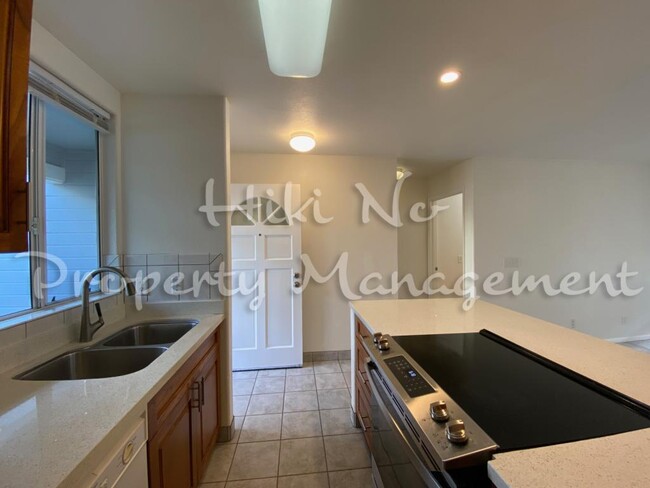 Building Photo - 75-6081 ALII DR, Apt D103