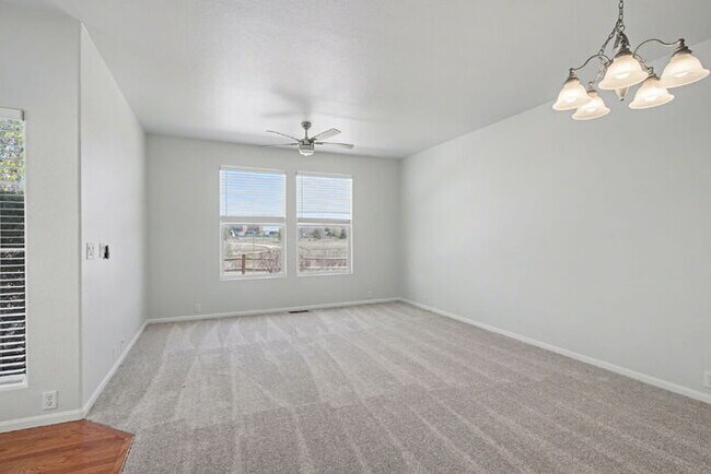 Building Photo - Beautifully Updated 3-Bedroom End-Unit Townhome Facing Open Space with Attached 2-Car Garage in G...