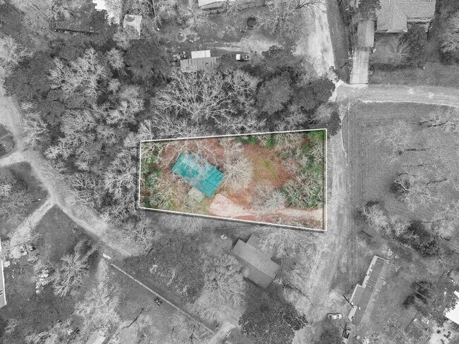 Building Photo - Rural, wooded living in this 4 bedroom, 2 full bath home on just under a quarter of an acre. NEW ...