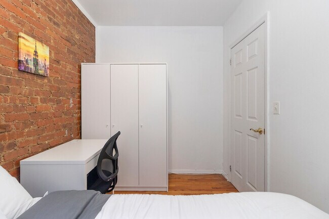 Building Photo - 309-311-311 E 95th St