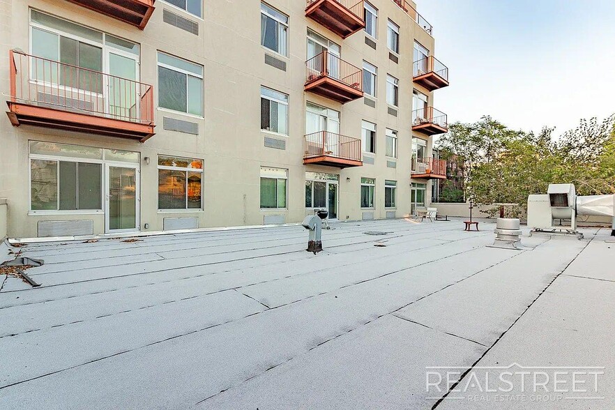 Building Photo - Massive Outdoor Patio | Spacious 3BR/2BA Apartment in Bushwick–East Williamsburg