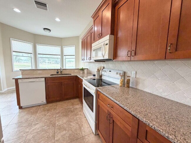 Building Photo - "Unfurnished Home on Golf Course in Hudson, FL - Spacious 1,853 Sq Ft Haven!"