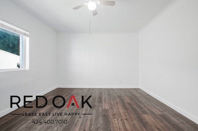 Building Photo - 1847 1/2 W Florence Ave