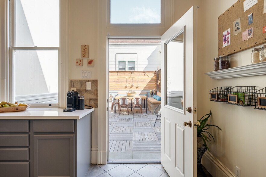 Spacious and bright kitchen opens to back deck - 2188 Sutter St