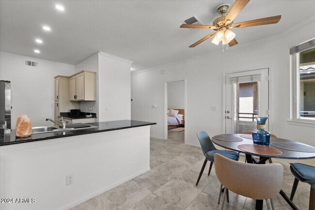 Building Photo - 7009 E Acoma Dr