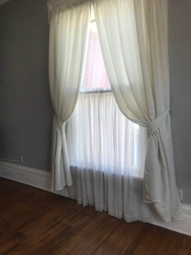 Curtains and drapes in LR and BR - 510 N Wayne St