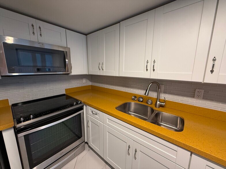 Open-concept KITCHEN - 780 NE 69th St