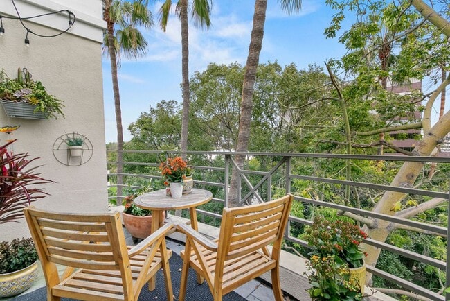 Building Photo - Elegant Furnished Penthouse Retreat with Treetop Views