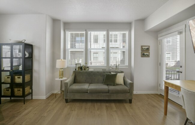 Building Photo - Modern Ground-Level Condo in River Terrace...