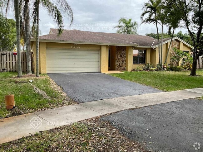 Building Photo - 11709 SW 50th Ct