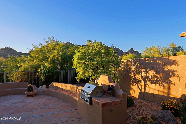 Building Photo - 6564 E Whispering Mesquite Trail