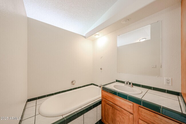 Building Photo - 3408 W Port Au Prince Ln