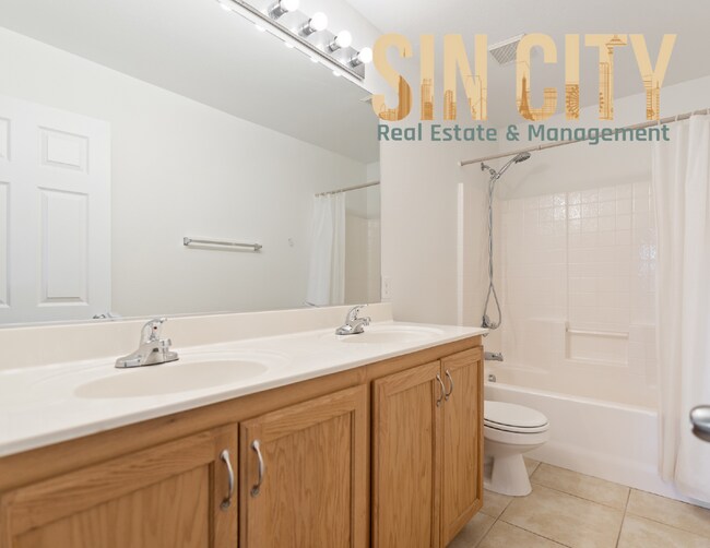Building Photo - "Charming 3-Bed Oasis with Granite Elegance on Gingerbread Man Ave, Las Vegas!"