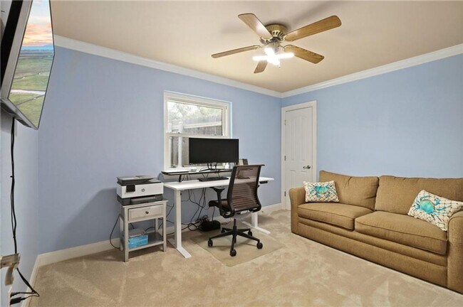 Building Photo - 4-bedroom, 1-story home with dedicated office space and large backyard!